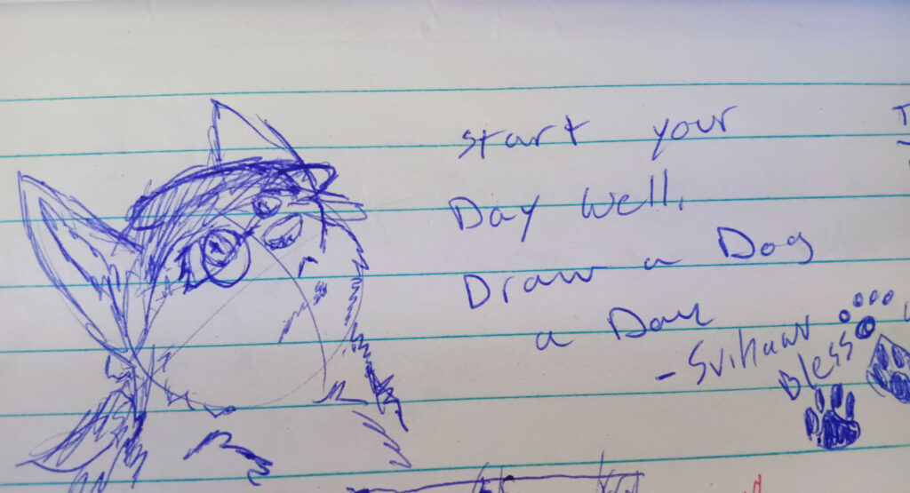 The Text Says, Start your day well. Draw a Dog a Day - Svihawu Bless. 

A chubby prairie wolf in a hat with round glasses named Valla is drawn in blue pen looking up and to the right. 